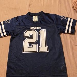 Blue Dallas Cowboys youth Ezekiel Elliot jersey.